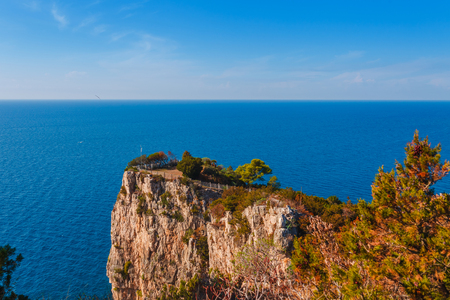 Panoramic sea landscape with Gaeta, Lazio, Italy. Scenic historical town with old buildings, ancient churches, nice sand beach and clear blue water. Famous tourist destination in Riviera de Ulisseの写真素材