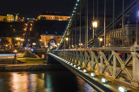 Night view of Budapest. Panorama cityscape of famous tourist destination with Danube and bridges. Travel illuminated landscape in Hungary, Europe.の写真素材