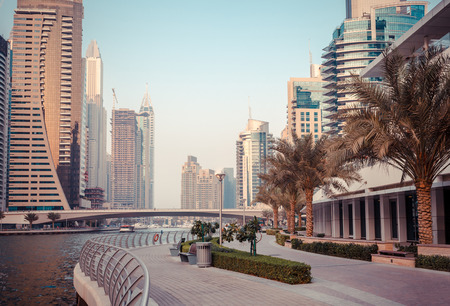 Panoramic view on downtown and promenade in Dubai Marina with modern high skyscrapers. Architecture and constructions of future. Famous tourist destinationの写真素材