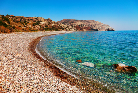 Beautiful beach on Petra tou Romiou (The rock of the Greek), Aphrodite's legendary birthplace in Paphos, Cyprus island, Mediterranean Sea. Amazing blue green sea and sunny day.の写真素材