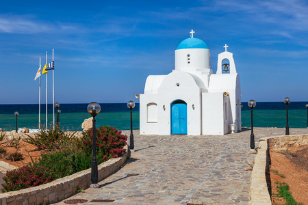 Orthodox church near of Protaras and Cavo Greco, Cyprus island, Mediterranean Sea. Bright sunny day.の写真素材