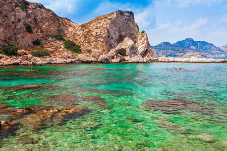 Sea skyview landscape photo of coastline near Stegna beach and Archangelos on Rhodes island, Dodecanese, Greece. Panorama with sand beach and clear blue water. Famous tourist destination in South Europeの写真素材