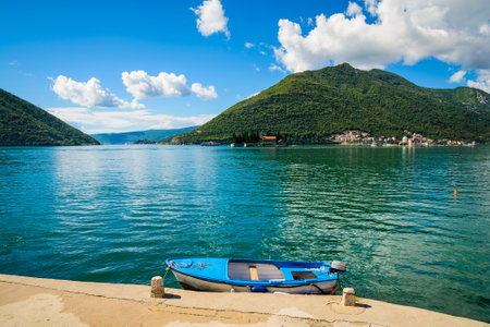 Harbor and boat at Boka Kotor bay (Boka Kotorska), Montenegro, Europe.の写真素材