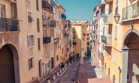 Street view of Nice, Cote d'Azur, France, South Europe. Beautiful city and luxury resort of French riviera. Famous tourist destination with nice beach on Mediterranean seaの写真素材