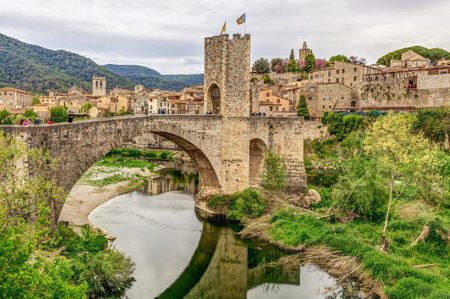 Panoramic landscape of Medieval village and castle in Besalu, Costa Brava, Spain. Besalu is a famous tourist destination in Spain, South Europe. Nice place for tourism near Mediterranean Seaの写真素材
