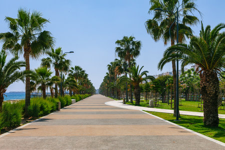 Coastline and promenade in Limassol, island Cyprus, Europe, Mediterranean Sea. Bright sunny day and blue water and sky.の写真素材