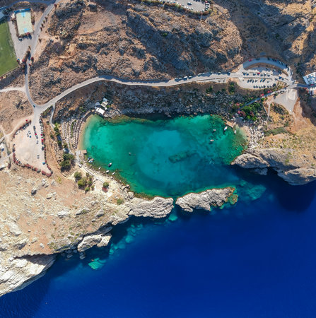Aerial birds eye view drone photo Saint Paul bay near village Lindos, Rhodes island, Dodecanese, Greece. Sunny panorama with lagoon and clear blue water. Famous tourist destination in South Europeの写真素材