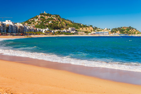 Sea landscape in Blanes, Catalonia, Spain near of Barcelona. Scenic town with nice sand beach and clear blue water in beautiful bay. Famous tourist resort destination in Costa Bravaの写真素材