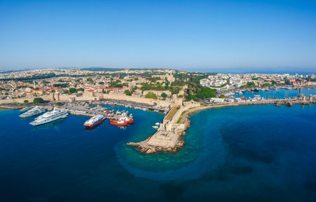 Aerial birds eye view drone photo of Rhodes city island, Dodecanese, Greece. Panorama with Mandraki port, lagoon and clear blue water. Famous tourist destination in South Europeの写真素材