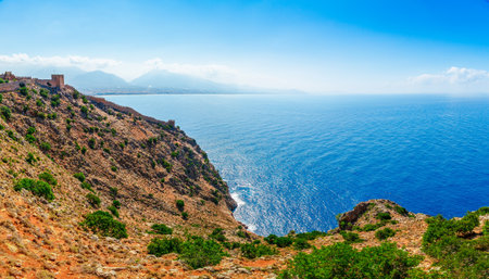 Beautiful sea panorama landscape of Alanya Castle in Antalya district, Turkey, Asia. Famous tourist destination with high mountains. Summer bright day and sea shoreの写真素材