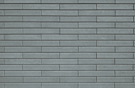 Template background with a wall texture made from gray decorative bricks.