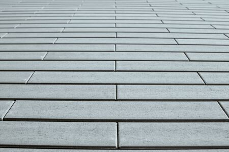 Gray brick wall in perspective. Template for design.の写真素材