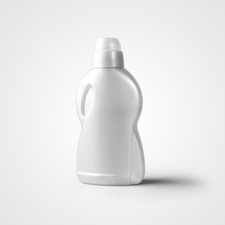 Mockup of white glossy plastic bottle for gel powder, isolated on background. Laundry liquid cans template, empty packaging without label, for design presentation, advertising and product promotionの写真素材