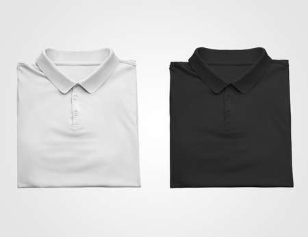 Mockup of white, black T-shirt, beautifully folded, blank polo for presentation of design, print, pattern. Men's clothing template with collar, buttons, front view, isolated on background.Set of clotheの写真素材