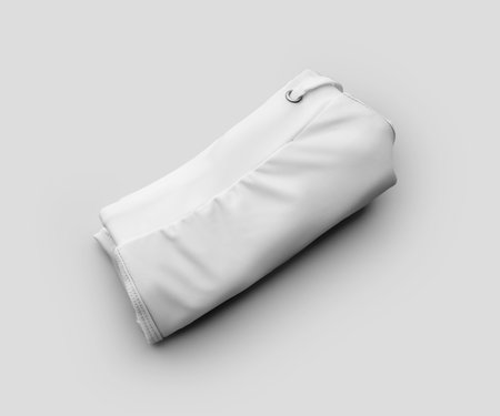 Mockup of folded white trunks for swimming, presentation of boxers with ties, side seam, for branding, design, pattern. Summer male swimwear template, isolated on background in studioの写真素材