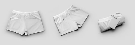 Set of white mockup male swimming trunks, subject close-up with ties, isolated on background. Template of fashionable summer clothes, boxers for design. Underpants, swimwearの写真素材