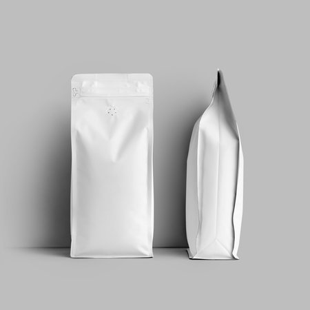 Mockup of a white bag for coffee beans, packaging with a degassing valve, front, side space for design, branding. set. Template of stable pack with tea, for advertising, isolated on backgroundの写真素材