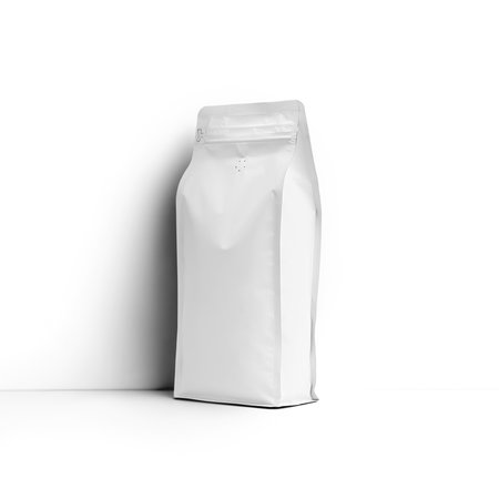 Mockup of a white stable bag for coffee beans, packaging with a degassing valve, front, side space for design, branding. Pack template for loose tea, isolated on background, for product advertisingの写真素材