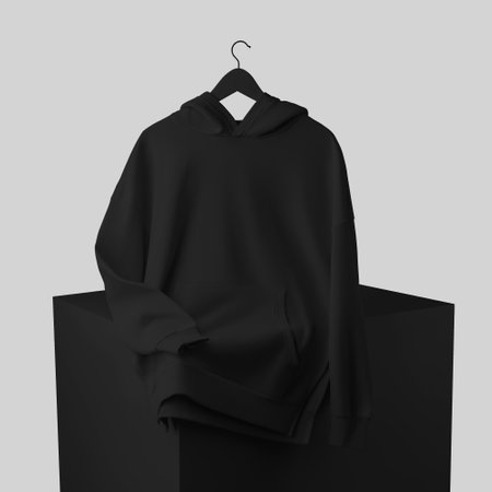 Template of a black long hoodie on a hanger, clouded on a cube, a fashion textured long sleeve hoodie, front view. Clothing mockup for design, isolated on background, product photography for commerceの写真素材