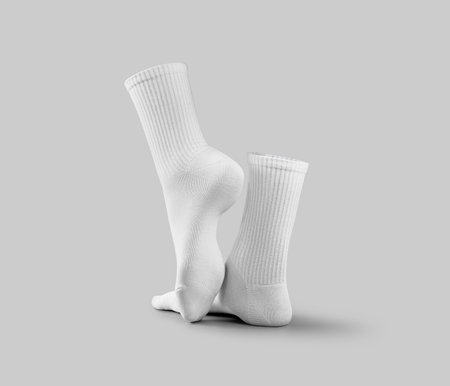 White high socks template 3d rendering, back view, one leg with pulled up toe, long gaiters for design, print, pattern. Casual wear mockup for foot, pair, isolated on background with shadowsの写真素材