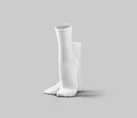 Mockup of white high socks, gaiters 3d rendering, front view, one leg with pulled up toe, pair of clothes for design, print, pattern, branding. Casual wear template for foot, isolated on backgroundの写真素材