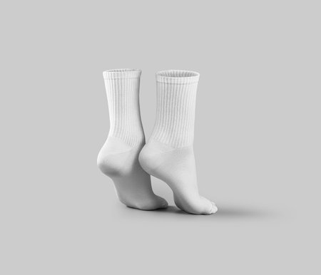 Mockup of white high socks on tiptoes, long gaiters 3d rendering, back view, pair apparel on feet, isolated on background. Fashion casual footwear template, for design, print, pattern, brandingの写真素材