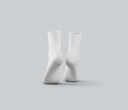 White medium socks 3d rendering mockup, on tiptoes, for design, branding, back view. Elastic gaiters template with average elastic band, isolated on background. Pair of apparel for advertisingの写真素材