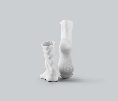 Mockup of white medium socks 3d rendering, stretched toes, for design, branding, back view. A pair of apparel. Template of a gaiter with an elastic average band, isolated on the backgroundの写真素材