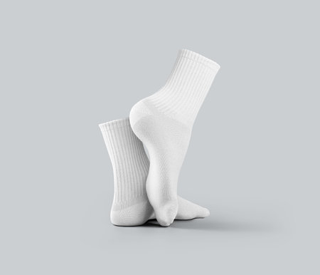 Template of white medium socks 3d rendering, stretched toes, gaiters with elastic band, isolated on background, side view. Mockup of a pair of clothes for design, pattern, advertisingの写真素材