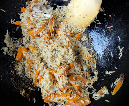 Picture of cooking pilaf on black bowl.の写真素材