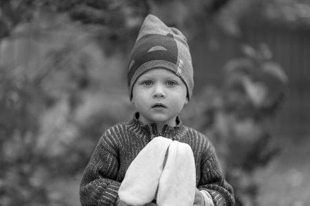 Beautiful baby boy with child face posing photographer for color photo, cadre consisting of baby boy...