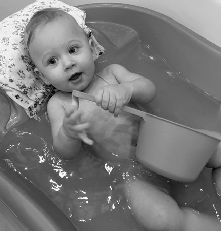 Beautiful baby boy with child face posing photographer for color photo, cadre consisting of baby boy in child image, caucasian expression face, healthy baby boy in child face relaxing for good shotの写真素材