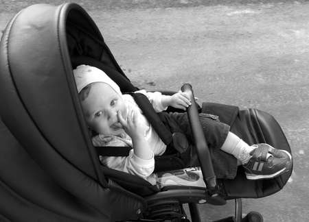 Beautiful baby boy with child face posing photographer for color photo, cadre consisting of baby boy...