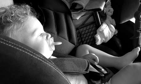 Beautiful baby boy with child face posing photographer for color photo, cadre consisting of baby boy in child image, caucasian expression face, healthy baby boy in child face relaxing for good shotの写真素材