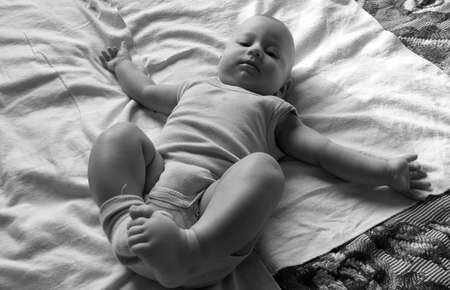 Beautiful baby boy with child face posing photographer for color photo, cadre consisting of baby boy...