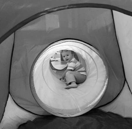 Beautiful baby boy with child face posing photographer for color photo, cadre consisting of baby boy in child image, caucasian expression face, healthy baby boy in child face relaxing for good shotの写真素材