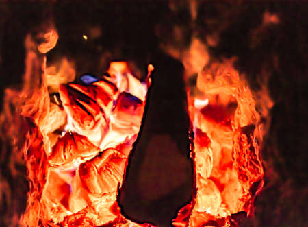 Beautiful old fireplace with light flame fire for heating building room, old fireplace consisting of...