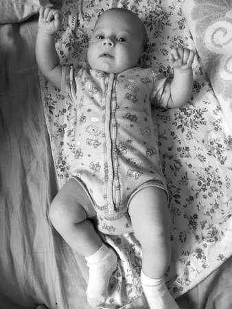 Beautiful baby boy with child face posing photographer for color photo, cadre consisting of baby boy...