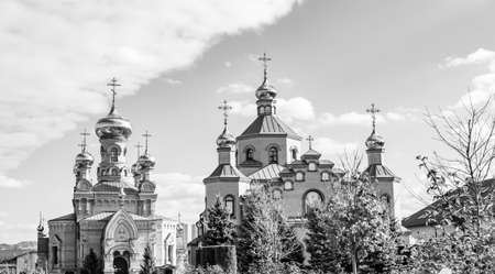 Christian church cross in high steeple tower for prayer, photography consisting of beautiful church...