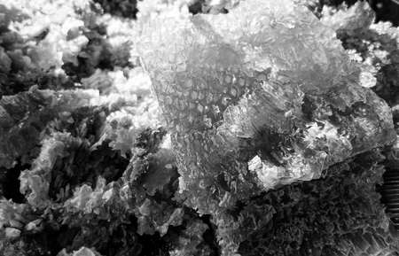 Drop of bee honey drip from hexagonal honeycombs filled with golden nectar, honeycombs summer composition consisting of drop natural honey, drip on wax frame bee, drop of bee honey drip in honeycombsの写真素材