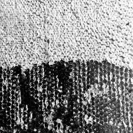 Drop of bee honey drip from hexagonal honeycombs filled with golden nectar, honeycombs summer composition consisting of drop natural honey, drip on wax frame bee, drop of bee honey drip in honeycombsの写真素材