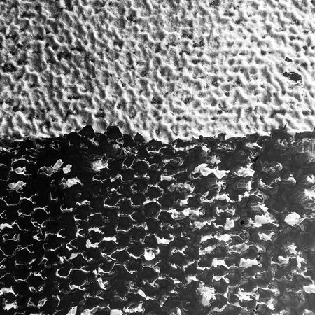 Drop of bee honey drip from hexagonal honeycombs filled with golden nectar, honeycombs summer composition consisting of drop natural honey, drip on wax frame bee, drop of bee honey drip in honeycombsの写真素材