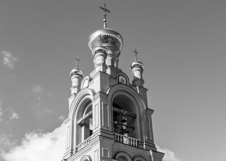 Christian church cross in high steeple tower for prayer, photography consisting of beautiful church...