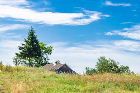 Beautiful old abandoned building farm house in countryside on natural background, photography...
