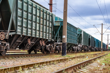Photography to theme railway track after passing train on railroad, photo consisting of long railway track before fast movement train by railroad, railway transportation track for train at railroadの写真素材