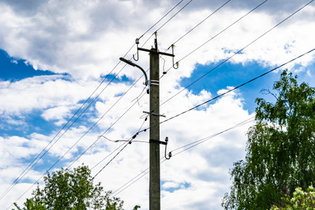 Power electric pole with line wire on colored background close up, photography consisting of power...
