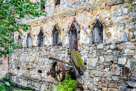 Photography on theme outstanding building beautiful brick old water mill, photo consisting of big...