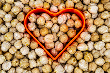 Beautiful organic dried chickpea beans consisting of raw Bengal legume pea. Dry egyptian legume pea seeds this is tasty food ingredient of chickpea beans. Edible healthy chickpea beans in legume peaの写真素材