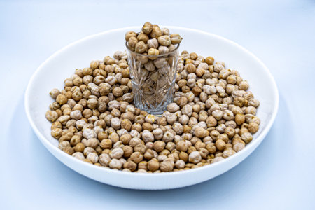 Beautiful organic dried chickpea beans consisting of raw Bengal legume pea. Dry egyptian legume pea seeds this is tasty food ingredient of chickpea beans. Edible healthy chickpea beans in legume peaの写真素材