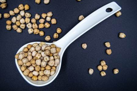 Beautiful organic dried chickpea beans consisting of raw Bengal legume pea. Dry egyptian legume pea...